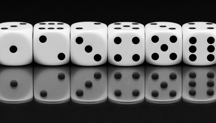 row of dice, illustrating one of the worst types of B2B blog posts – an unnecessary series