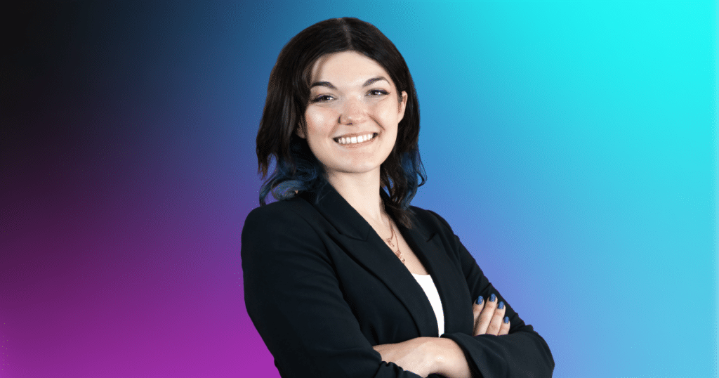 Photo of Christina Balog in front of a gradient background.